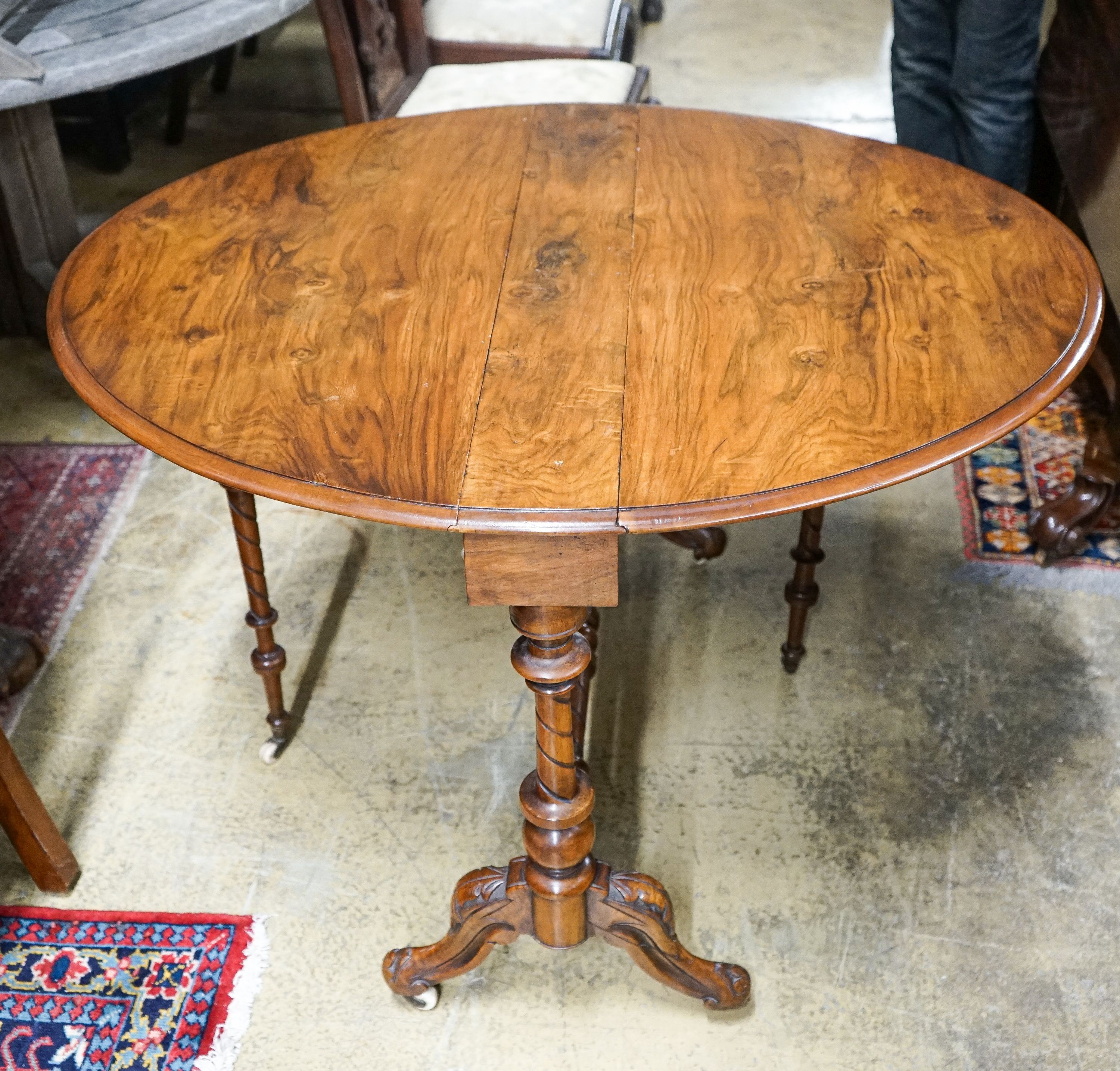 A Victorian walnut Sutherland table, width 90cm, height 71cm